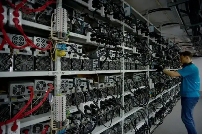 Image of hundreds of computer processors linked to form a powerful mining rig for Bitcoin. 